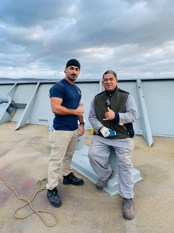 Two SIU crew members aboard the Cape Intrepid
