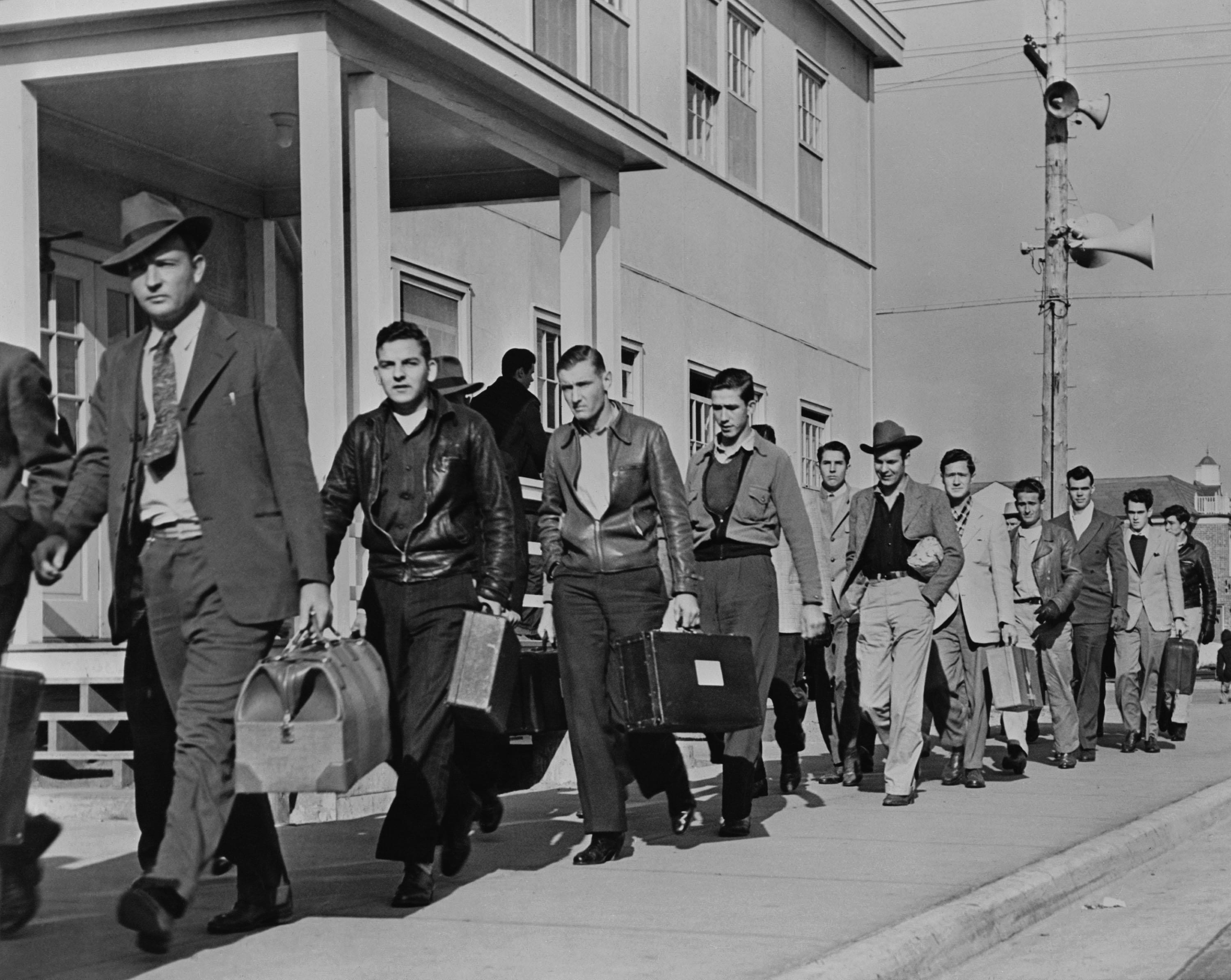 Enrollees from across the country arriving at the United States Maritime Service training station at Sheepshead Bay, New York, early 1940s.