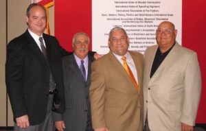 Group photo with four people including John Natoli