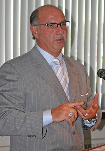 Photo of Bart Rogers speaking at a meeting