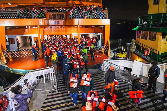 Photo of passengers boarding a ferry